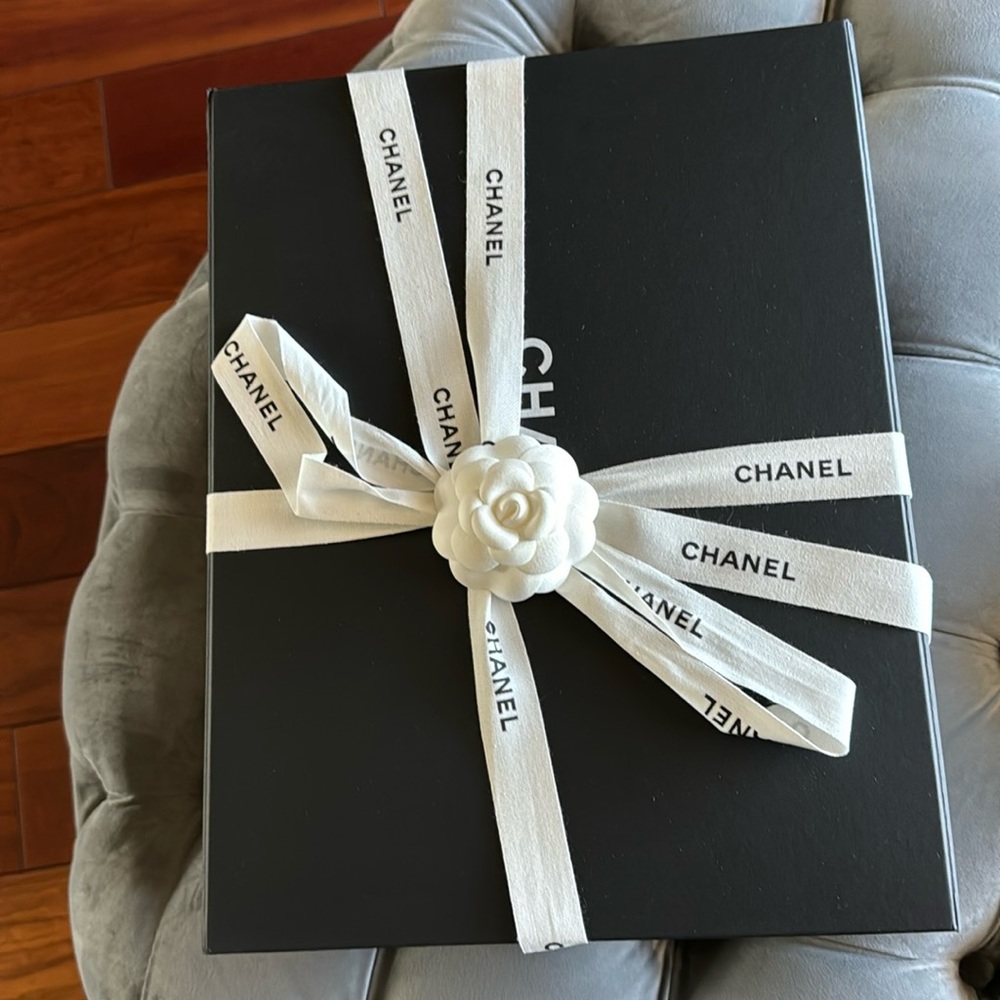 Chanel box with ribbon and signature flower